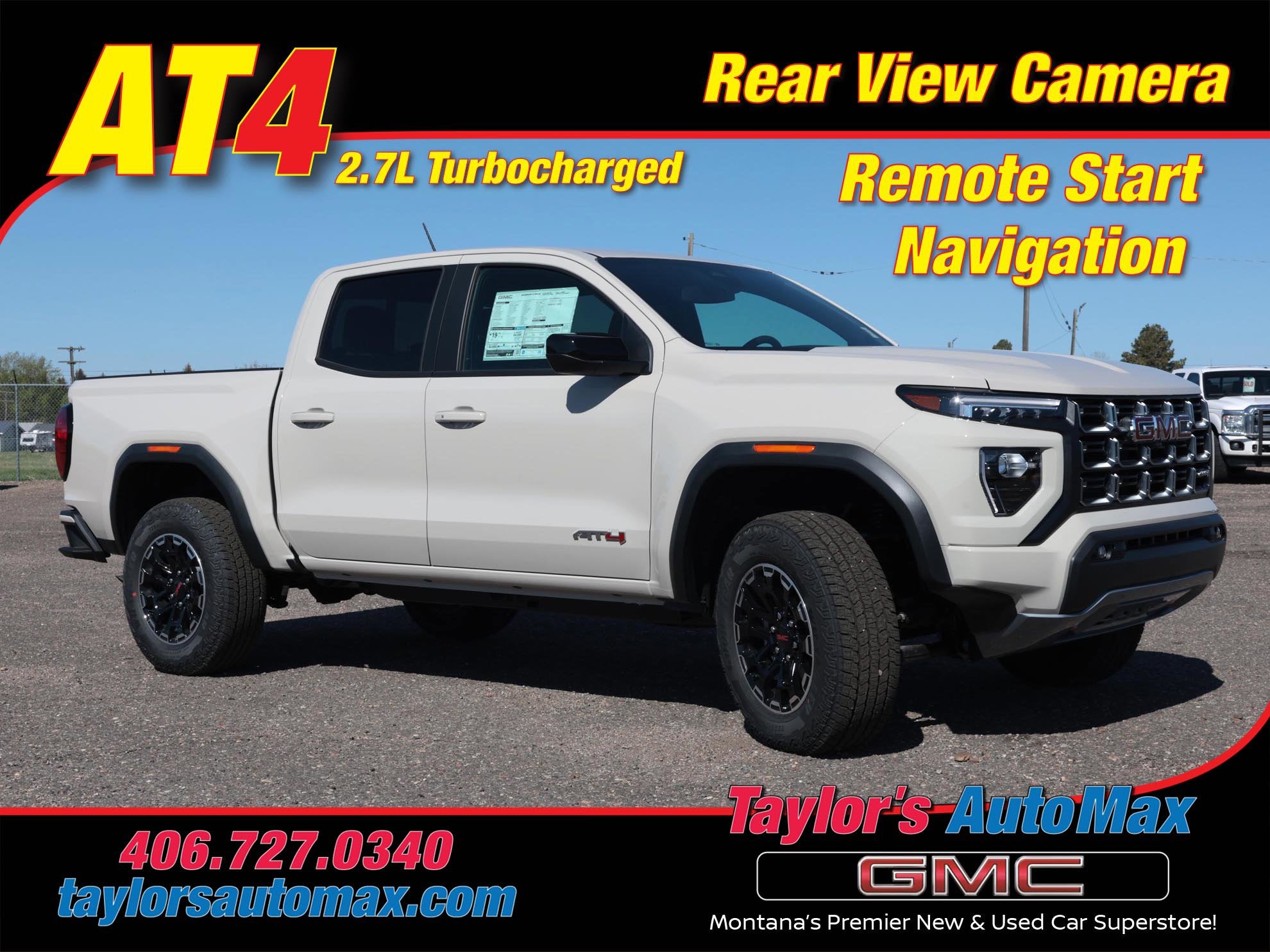 2026 GMC Canyon AT4 in Coastal Dune — front three-quarter view