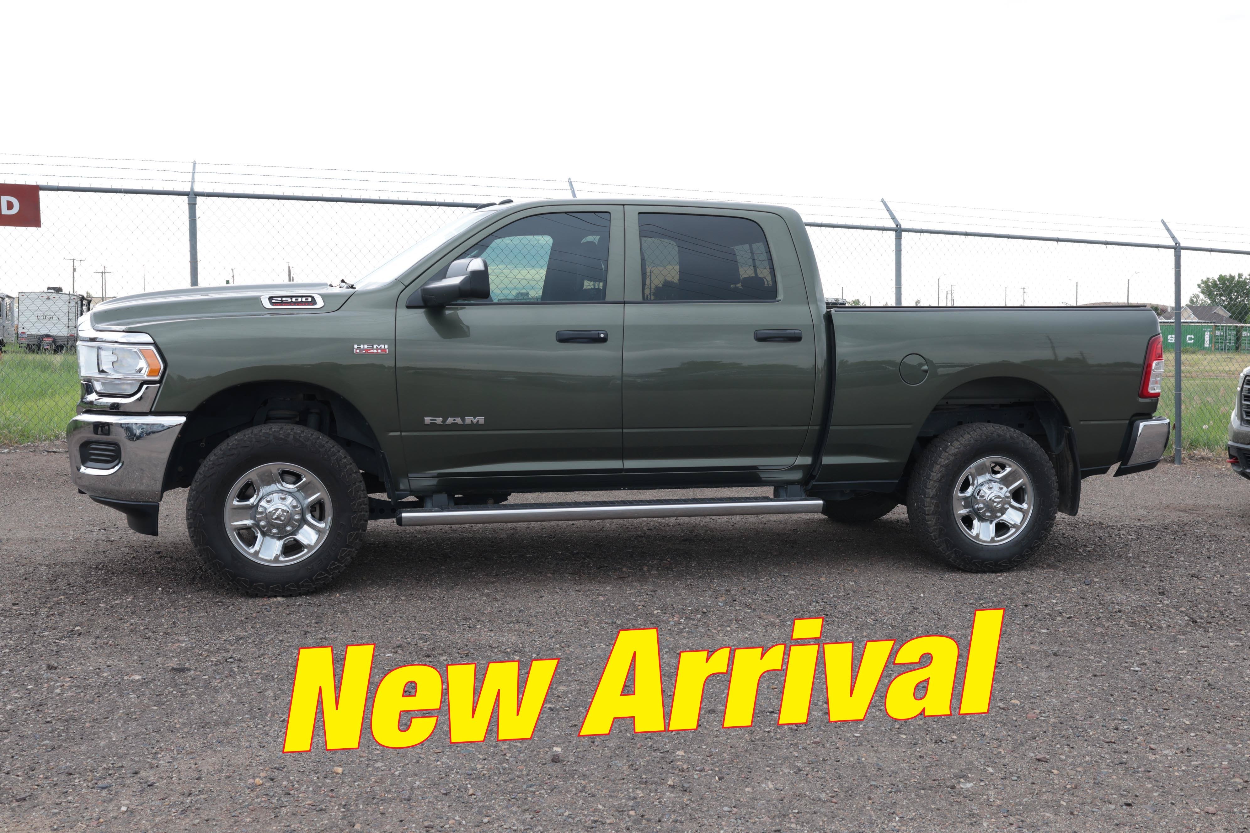 2021 RAM 2500 Tradesman in Olive Green Pearlcoat — front three-quarter view
