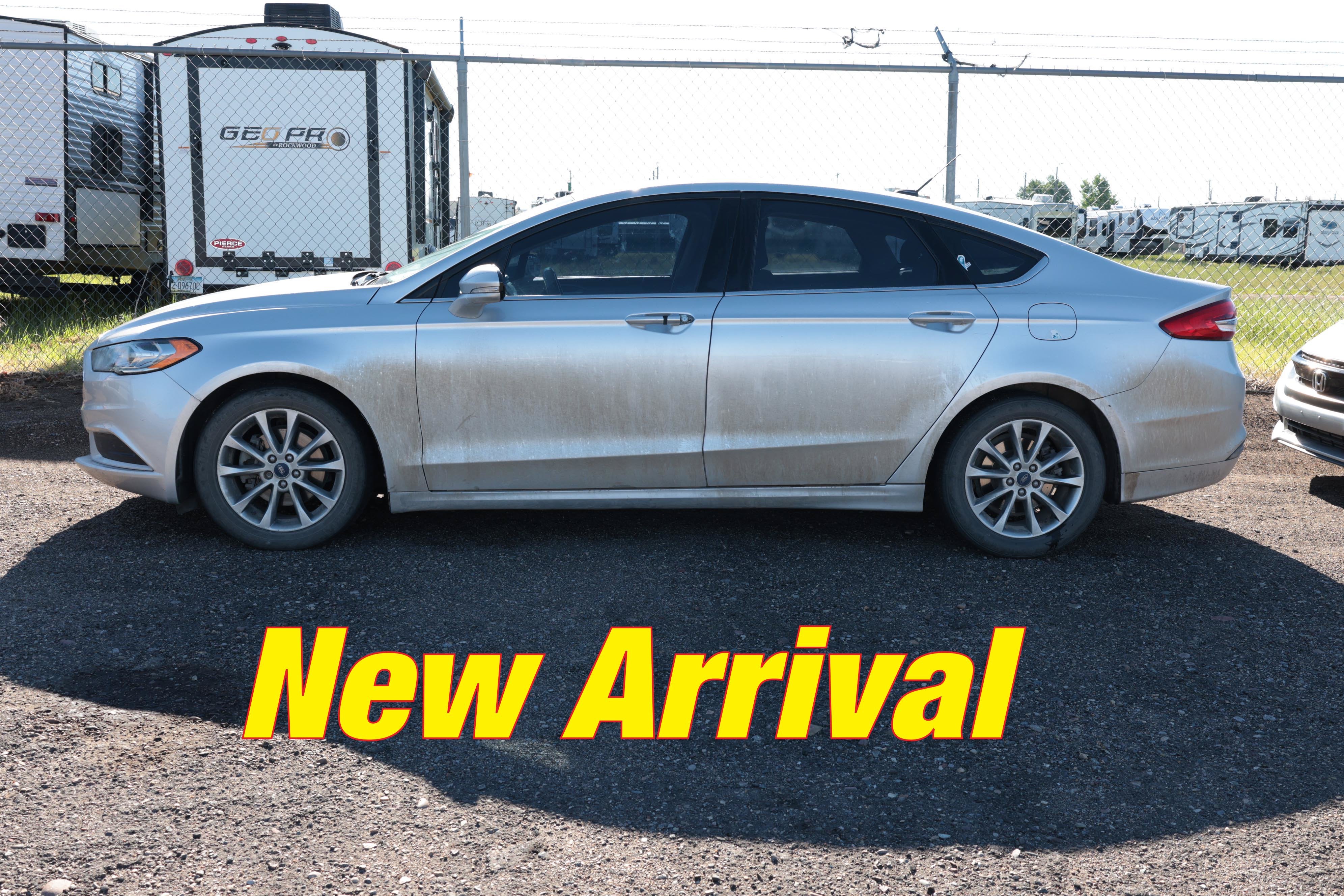 2017 Ford Fusion SE in Ingot Silver — front three-quarter view