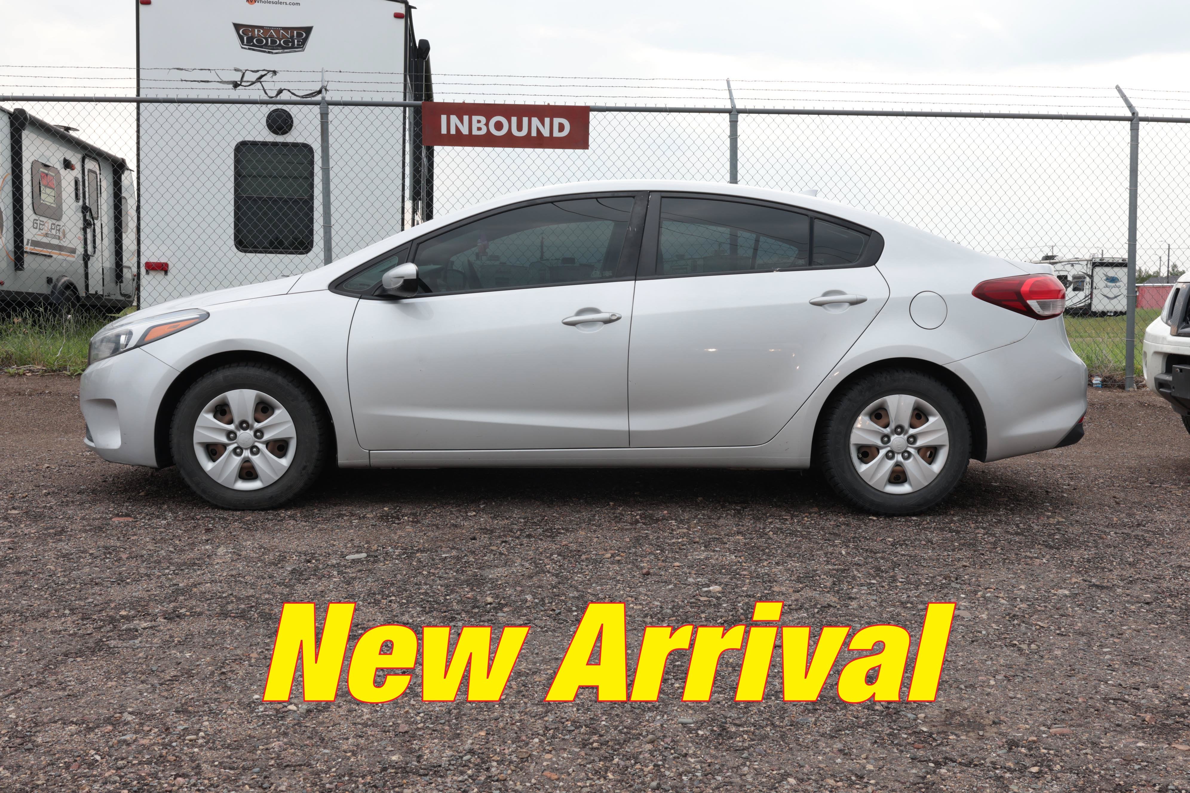 2018 Kia Forte LX in Silky Silver — front three-quarter view